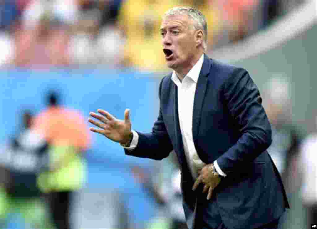 France's head coach Didier Deschamps shouts out during the World Cup round of 16 soccer match between France and Nigeria at the Estadio Nacional in Brasilia, Brazil, Monday, June 30, 2014. (AP Photo/Martin Meissner)