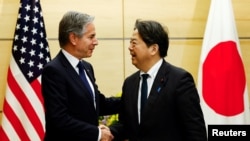 U.S. Secretary of State Antony Blinken shakes hands with Japanese Chief Cabinet Secretary Yoshimasa Hayashi at Prime Minister Shigeru Ishiba's official residence in Tokyo, Jan. 7, 2025.