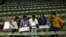 Polling officials check electronic voting machines (EVM) after collecting them from a distribution center on the eve of the final phase of general election in Kolkata, May 11, 2014.