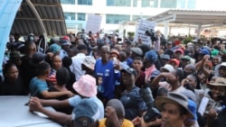 Scores of people march amid concerns about corruption in state enterprises, in Gaborone, Botswana, Nov 18, 2024. 