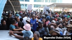 Scores of people march amid concerns about corruption in state enterprises, in Gaborone, Botswana, Nov 18, 2024. 