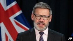Iain Lees-Galloway addresses a press conference at Parliament in Wellington, New Zealand, on July 6, 2020. 