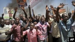 Residents protest the results of the Orange Democratic Movement primary elections in Kisumu in western Kenya, January 20, 2013.