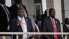 FILE - South Sudan's President Salva Kiir, right, and Vice President Riek Machar attend a Holy Mass led by Pope Francis at the John Garang Mausoleum in Juba, South Sudan, Feb. 5, 2023. 