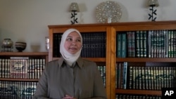 Dr. Rania Awaad stands for a portrait at her home in Union City, California, June 23, 2021.