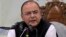 FILE - India's Finance and Defense Minister Arun Jaitley speaks during a news conference in Srinagar, India, June 2014.