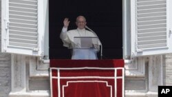 Pope Francis delivers his blessing during the Angelus prayer in St. Peter's Square, at the Vatican, July 2, 2017. 