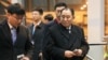 FILE - North Korean official Kim Yong Chol, right, prepares to leave the Beijing International Airport in Beijing, Jan. 17, 2019.