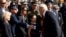 U.S. President Donald Trump shakes hands while attending the 9/11 observance at the National 9/11 Pentagon Memorial in Arlington, Virginia, Sept. 11, 2017.