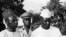FILE - Ahmed Seku Toure (R), President of Guinea, the new independent state in South West Africa, is greeted in the 1960s in Banjul by Sir Dawda Jawara, President of Gambia. 