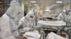 Nurses attend Covid-19 patients at the intensive care unit of a hospital in Athens on November 20, 2020.