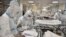 Nurses attend Covid-19 patients at the intensive care unit of a hospital in Athens on November 20, 2020.
