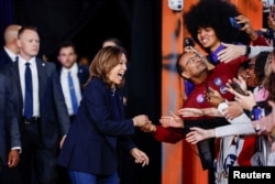 Democratic presidential nominee and U.S. Vice President Kamala Harris meets with supporters at The Alan Horwitz "Sixth Man" Center, a youth basketball facility, as she campaigns in Philadelphia, Pennsylvania, Oct. 27, 2024.