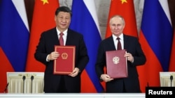中国领导人习近平与俄罗斯总统普京在莫斯科克里姆林宫签署协议。（2023年3月21日）