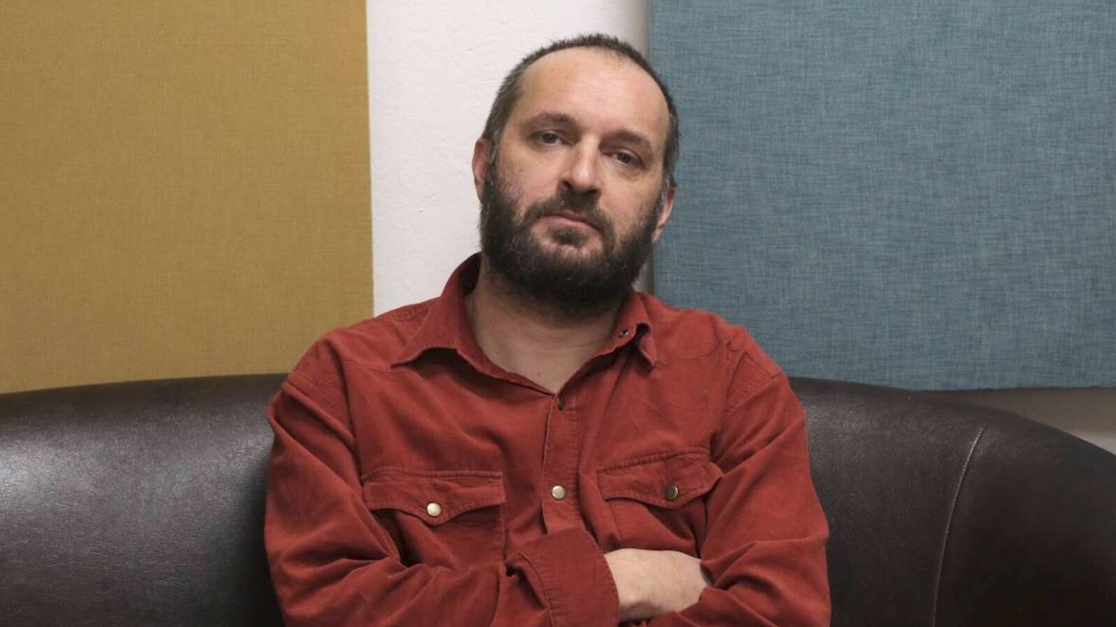 Journalist Slavisa Milanov is one of several people in Serbia to have had spyware installed on their cellphones. (Stefan Pavic)