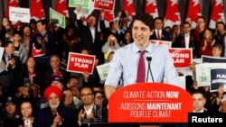 FILE - Canadian Prime Minster Justin Trudeau speaks at a Liberal Climate Action Rally in Toronto, Ontario, Canada, March 4, 2019. 
