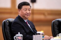 Chinese President Xi Jinping meets Ugandan President Yoweri Museveni (not pictured) at the Great Hall of the People in Beijing, China, June 25, 2019.