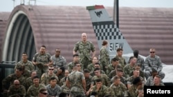 FILE - U.S. troops gather for a speech in Osan Air Base, South Korea, June 30, 2019.