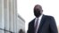 Newly confirmed U.S. Defense Secretary Lloyd Austin arrives to begin his first day in office at the Pentagon in Arlington, Virginia, U.S., January 22, 2021. REUTERS/Tom Brenner