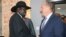 FILE - South Sudan's President Salva Kiir, left, shakes hands with UN chief David Shearer during meetings with the UN Security Council on Oct. 20, 2019, about the status of the country's peace deal.