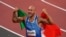 Lamont Marcell Jacobs of Italy celebrates after winning the gold medal in the final of the men's 100-meters at the 2020 Summer Olympics, Aug. 1, 2021, in Tokyo, Japan.