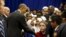 U.S. President Barack Obama greets students after his remarks at the Islamic Society of Baltimore mosque in Catonsville, Maryland, Feb. 3, 2016.