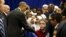 U.S. President Barack Obama greets students after his remarks at the Islamic Society of Baltimore mosque in Catonsville, Maryland, Feb. 3, 2016.