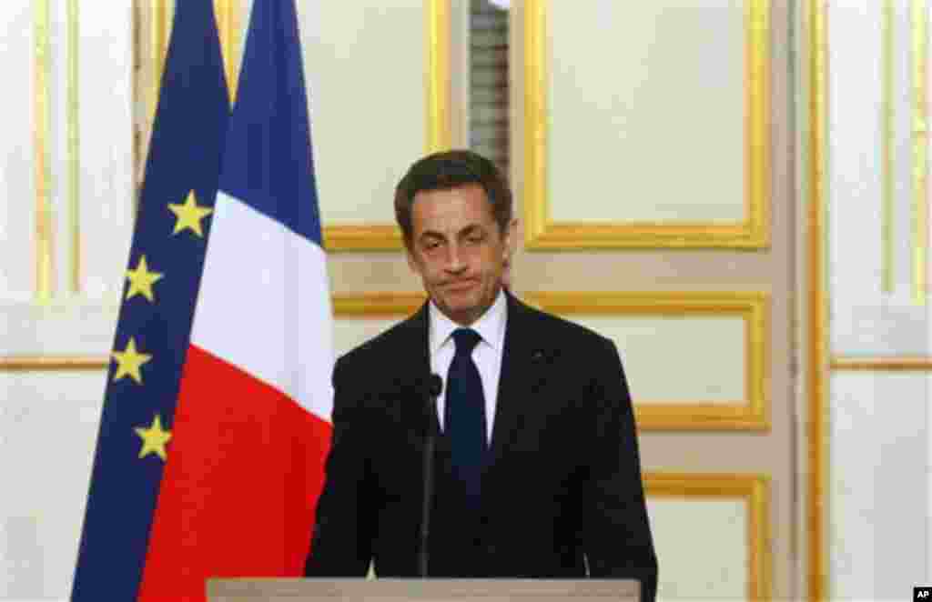 France's President Nicolas Sarkozy pauses as he delivers his speech on the Toulouse gunman, at the Elysee Palace in Paris, Wednesday, March 21, 2012. A predawn police raid on a home in Toulouse erupted into a firefight Wednesday with a gunman who claims c