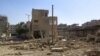 A view of rubble and damaged buildings after what activists said was shelling by forces loyal to Syria's President Bashar al-Assad in Daraya, February 4, 2013.