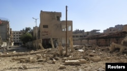 A view of rubble and damaged buildings after what activists said was shelling by forces loyal to Syria's President Bashar al-Assad, Daraya, Feb. 4, 2013.