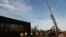 Workers break ground on new border wall construction about 20 miles west of Santa Teresa, N.M., Aug. 23, 2019. The wall visible on the left was built in 2018. The new construction is funded by money reallocated from the Department of Defense. 