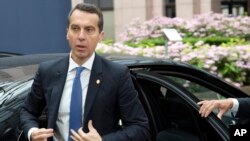 FILE - Austrian Federal Chancellor Christian Kern arrives for an EU summit in Brussels, June 29, 2016.