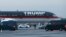 FILE - A plane carrying President-elect Donald Trump taxis at LaGuardia Airport, Dec. 13, 2016, in New York