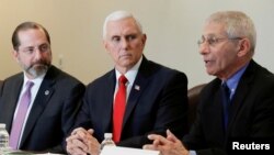 Mataimakin shugaban Amurka, Mike Pence yayin da ya ke magana a wani taro kan Coronavirus.