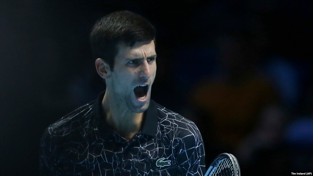 Novak Đoković slavi osvajanje poena protiv Južnoarfikanca Kevina Andersona u Londonu (Foto: Tim Ireland)