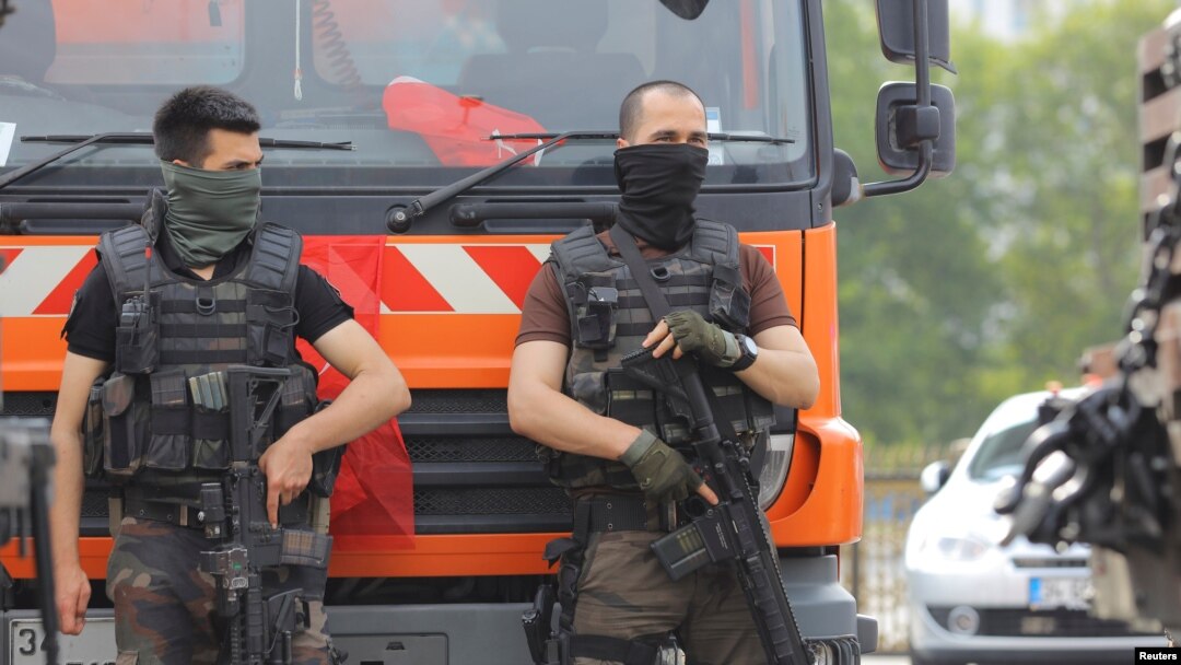 Members of the police special forces stand guard in front of the Air Force Academy in Istanbul, Turkey, July 18, 2016. 