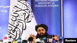 FILE - Taliban acting Foreign Minister Amir Khan Muttaqi speaks during a news conference in Kabul, Afghanistan, Sept. 14, 2021. 