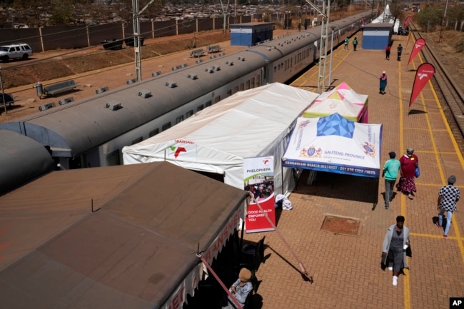 The Phelophepa train, is stationed at a station in Tembisa, east of Johannesburg, South Africa, Thursday, Aug. 22, 2024. (AP Photo/Themba Hadebe)