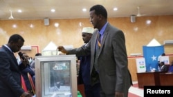 FILE - A member of parliament for the semiautonomous region of Puntland casts his vote in Puntland's presidential election in Garowe, Puntland state, northeastern Somalia, Jan. 8, 2019.