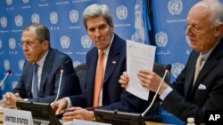 FILE - U.N. Special Envoy for Syria Staffan de Mistura, right, shows a copy of a Security Council resolution concerning Syria, during a press conference with Russian Foreign Minister Sergei Lavrov, left, and U.S. Secretary of State John Kerry at U.N. headquarte