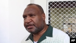 Papua New Guinea Prime Minister James Marape arrives for a meeting at the annual Pacific Islands Forum in Nuku'alofa, Tonga, Aug. 27, 2024.