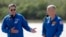 NASA astronauts Robert Behnken, left, and Doug Hurley speak during a news conference after they arrived at the Kennedy Space Center in Cape Canaveral, Fla., May 20, 2020. 