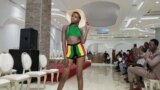 A South Sudanese model walks the runway at South Sudan Fashion Week at Juba's Crown Hotel August 6 wearing an outfit created by designer Wilma Amito. (VOA/Winnie Cirino) 