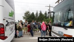 Des bus transportant des migrants