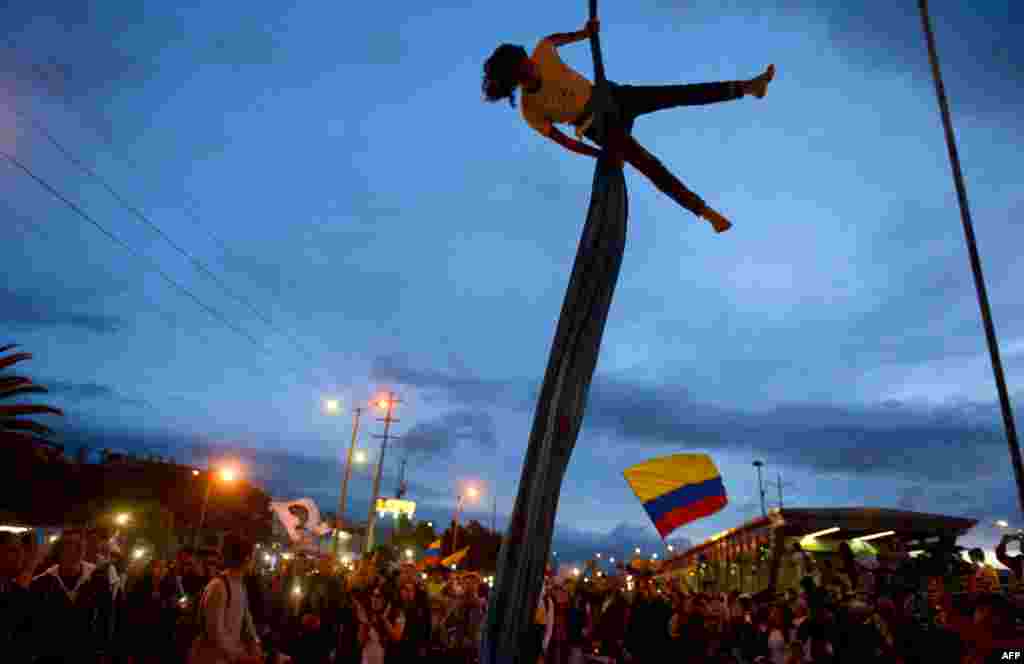 An artist performs during a demonstration against the government of Colombian President Ivan Duque during a national strike in Bogota, Nov. 27, 2019.