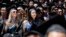 Graduates listen to U.S. President Barack Obama (not pictured) talk during the commencement ceremony for the University of California, Irvine at Angels Stadium in Anaheim, California June 14, 2014. 