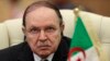 Algeria's President Abdelaziz Bouteflika listens to the speech of Libya's leader Moammar Gadhafi at the third European Union-Africa summit in Tripoli, November 2010.