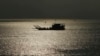 A ferry transports people from Phnom Penh to Arey Ksat across the Mekong River outside Phnom Penh, Cambodia, Jan. 28, 2020.