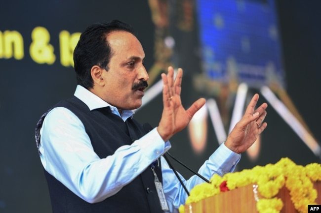 S. Somanath, chairman of the Indian Space Research Organisation (ISRO) addresses an event at the ISRO Telemetry Tracking and Command Network (ISTRAC) center in Bengaluru on August 23, 2023, after the successful lunar landing. (Photo by Mohan KUMAR / AFP)