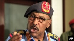 Sudanese Defense Minister Abdelrahim Mohamed Hussein speaks during joint news conference with his southern counterpart John Kong Nyuon after signing an agreement, in Khartoum September 18, 2011.